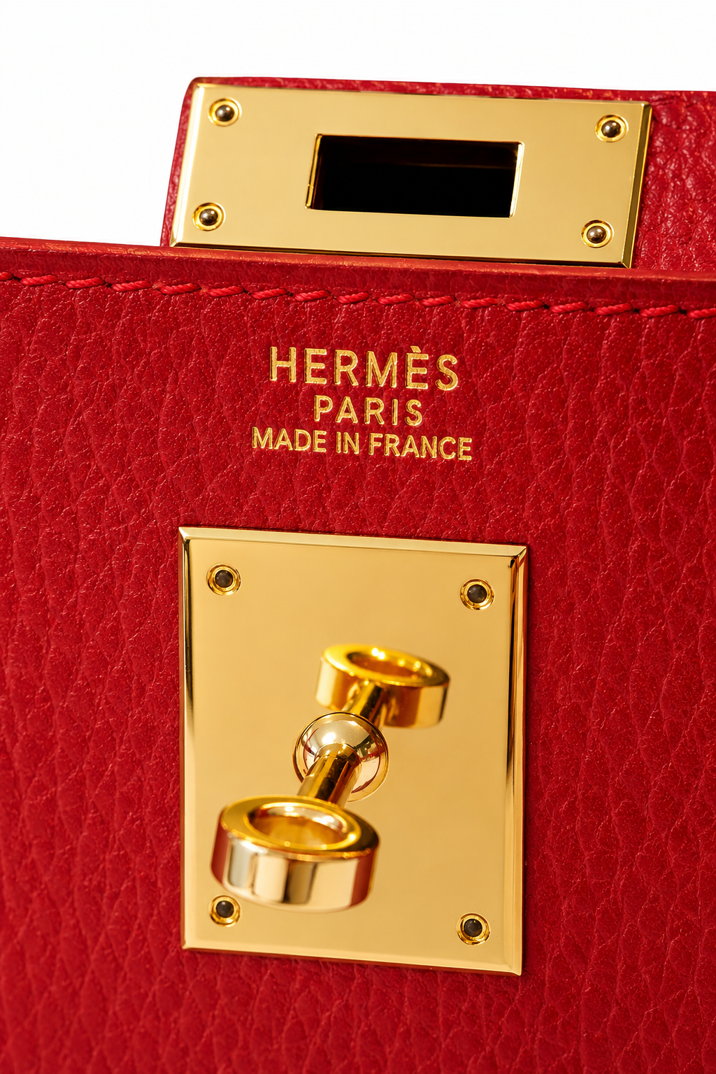 A MIKUN specialist examining a luxury handbag